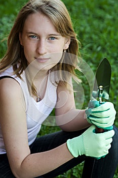 Gardener. Girl working in garden