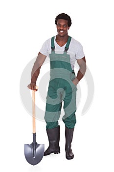 Gardener holding shovel