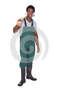 Gardener holding shovel