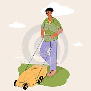 Gardener with lawn mower cuts grass