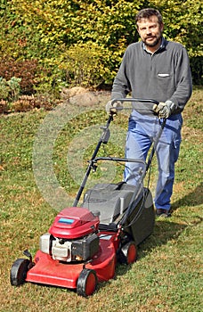 Gardener with lawnmower