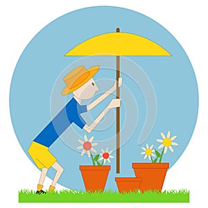 Gardener man with the flowers and a parasol