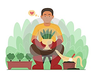 Gardener Man Planting a Sapling of Tree with Pot in Garden