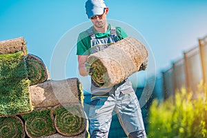 Gardener with Piece of Turf