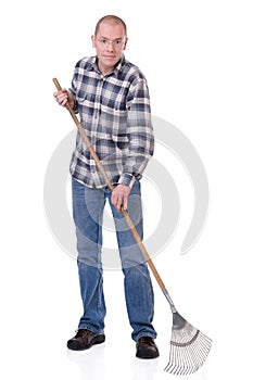 Gardener with a rake