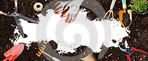 Gardening banner illustration - garden tools on brown soil and blank space