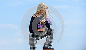 Gardening and botany concept. Girl fashion model carry hydrangea flowers. Spring fresh bouquet. Flowers tender spring