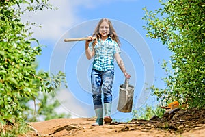 Gardening guide for beginners. Gardening tips. Spring gardening. Girl child hold shovel watering can. Spring gardening