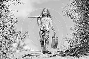 Gardening guide for beginners. Gardening tips. Spring gardening. Girl child hold shovel watering can. Spring gardening