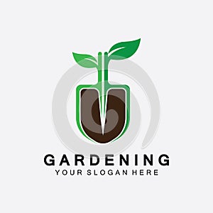 Gardening logo with shovel icon and tree with green leaves logo template