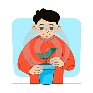 Gardening. Man plants a sprout in a pot.