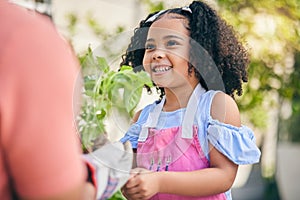 Gardening, parent and girl child with plants in backyard, teaching and learning with growth in nature. Smile