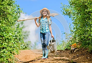 Gardening tips. Spring gardening. Girl child hold shovel watering can. Spring gardening checklist. Little helper