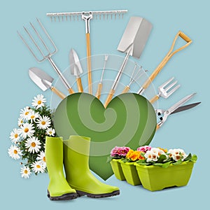 Gardening tool equipment and green heart shape, rubber boots and daisies flowers isolated on blue background. Banner for online