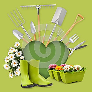 Gardening tool equipment and green heart shape, rubber boots and daisies flowers isolated on green background. Banner for online