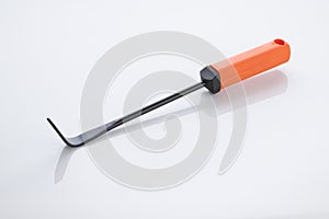 Gardening Tools: Close up of a Cape Cod Weeder Isolated on White Background Shot in Studio.