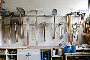 Gardening tools on a wall