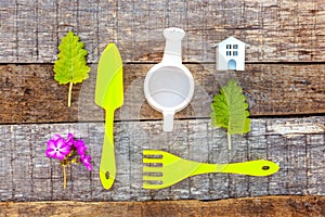 Gardening Tools on wooden background