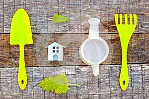 Gardening Tools on wooden background