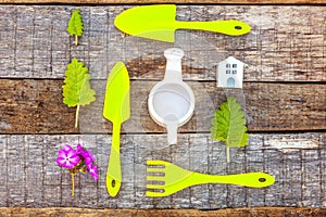 Gardening Tools on wooden background