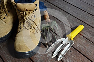 Gardening tools with work boots