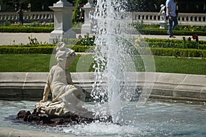 The gardens of the Branicki Palace, with fountains, and sculptures.