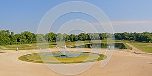 Gardens of Chantilly castle on a sunny day, Oise, France