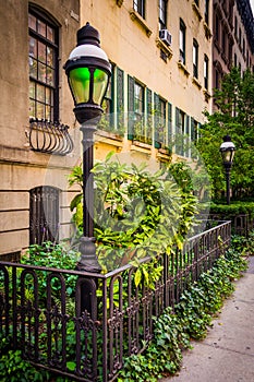 Gardens and townhouses along 23rd Street in Chelsea, Manhattan, photo