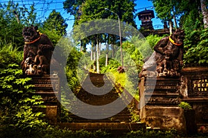 Gardian statue at entrance Bali Bali Hindu temple photo