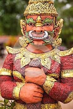 Gardian statue at entrance Thailand Temple photo