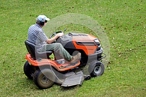 Gardner on ride-on lawn