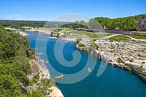 Gardon river at Pont du Gard, a part of Roman aqueduct in southern France near Nimes.