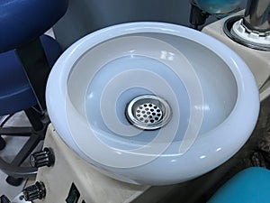 Gargle ceramic basin in dental clinic for patient