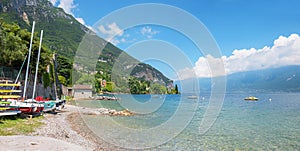 Gargnano beach at coastline lake Gardasee, italy