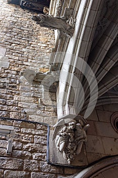 Gargoyle statues on the wall of the cathedral in Ciutat Vella,  Barcelona, Spain