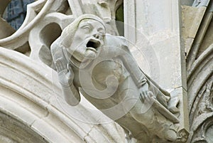 Gargoyle at the wall of the Basilique Saint-Nazaire-et-Saint-Celse in Carcassonne, France.