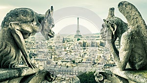 Gargoyles or chimeras on the Notre Dame de Paris overlooking the Paris city, France