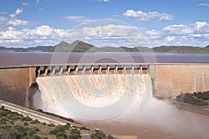 Gariep Dam with floodgates overflowing photo