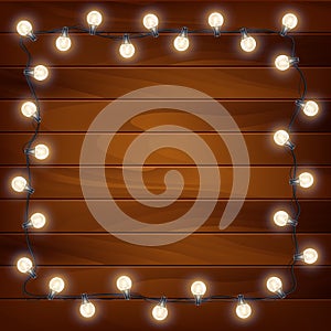 Garland on a wooden background. Christmas lights. Vector illustration