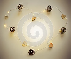 A garland of wooden hearts, cones in the shape of a heart