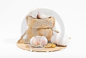 Garlic is antiviral and is a cold and flu remedy. Picture of spicy seasoning ingredients, head of garlic
