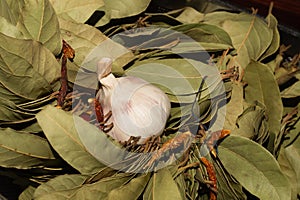 Garlic and bay leaves. dried hot peppers