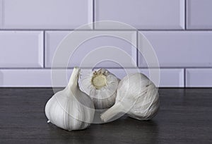 Garlic bulb on gray wooden background