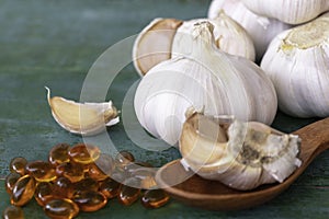 Garlic bulbs, capsules of oil extract.