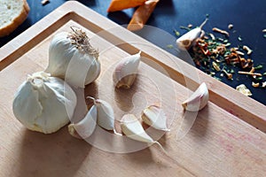 Garlic bulbs and cloves close-up view. Food background