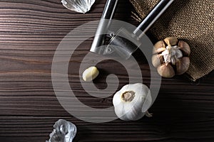 Garlic Bulbs and Cloves on Rustic Table