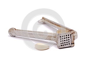 Garlic clove and crusher