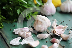 Garlic cloves and ingredients to make toum sauce or a salad dressing