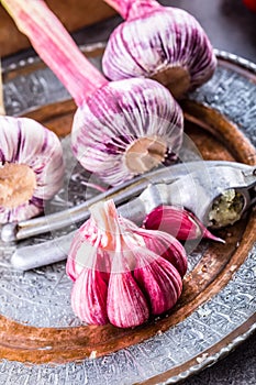 Garlic. Fresh garlic. Red garlic. Garlic press. Violet garlic.Garlic background. garlic bulbs