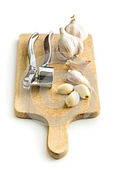 Garlic and garlic press.